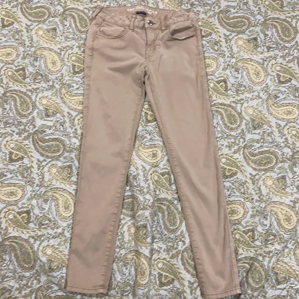 American Eagle khaki Super Stretch size 4.